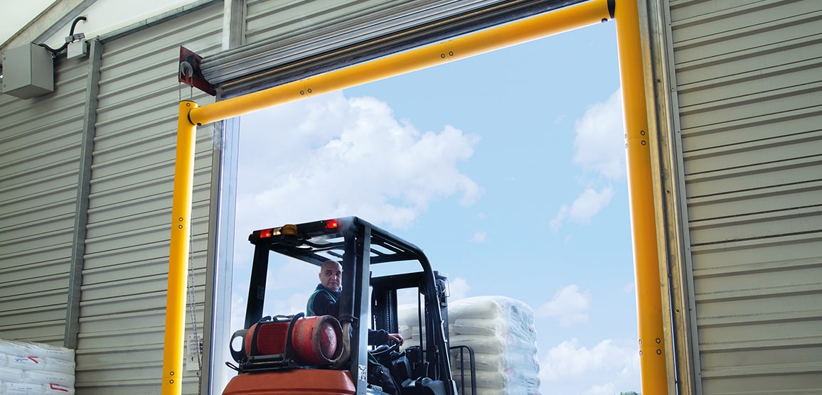 Height Restriction Barriers Protecting Warehouse Entrance from Forklift