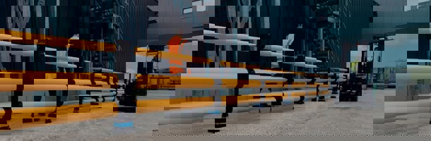 Industrial Polymer Pedestrian Safety Barriers Protecting Walkway from Forklift Impacts